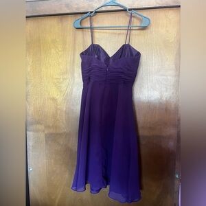 A beautiful royal purple mini dress from Alfred Angelo
